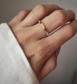 Flexible ring with natural stones, beige cubic zirconia and garnet