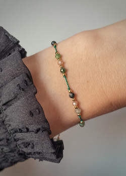 Bracelet natural stones zoisite with ruby ​​zircon, champagne, silk thread