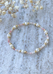 A bracelet on an elastic band with natural Opal stones and natural pearl